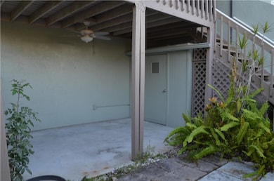 Property entrance featuring ceiling fan and a patio area