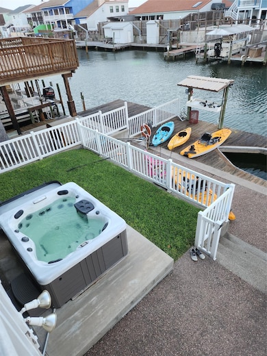 View of dock featuring a residential view, a wate