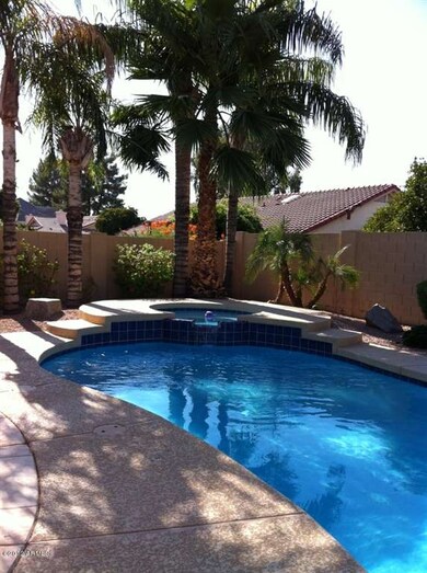 Pool with waterfall feature