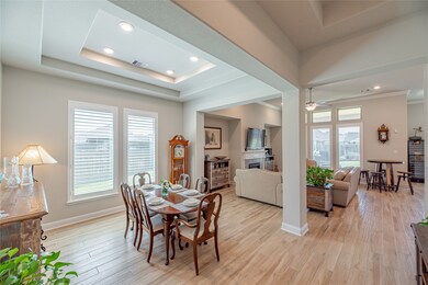 Entertaining in this dining space comes easy with direct access to the kitchen. Crown molding adds a touch of elegance to the space. This space is sure to captivate all of the holiday memories your family is sure to create.

