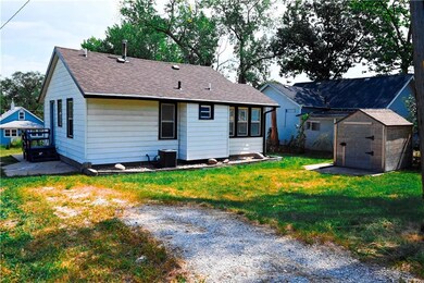 back with shed and driveway