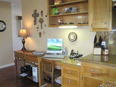 KITCHEN AREA WITH BUILT-IN DESK