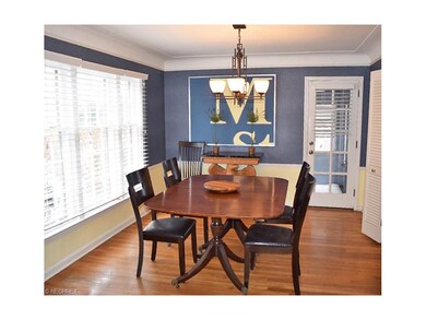 Coved ceiling, sun room off dining room. Louver do