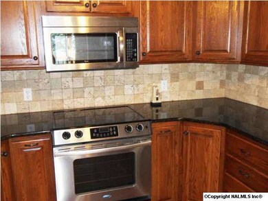Kitchen with granite countertops