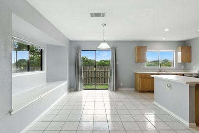 Kitchen featuring light countertops, healthy amou