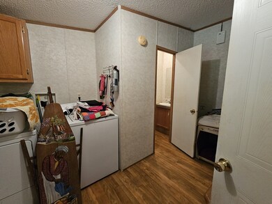 Utility Room w/ 1/2 bath 12'x9'.