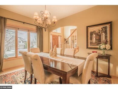 Dining room features wood floors and serene front 