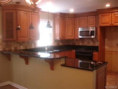 Beautiful updated kitchen with tile flooring.