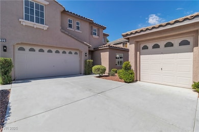 View of front of property with concrete driveway,