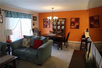 Another view of the living room and dining room.  