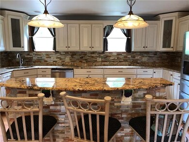 Granite kitchen with updated appliances with overs