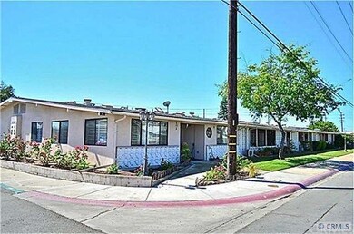 FABULOUS CORNER LOCATION WITH RAISED ROSE GARDEN..
