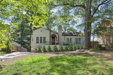 A wonderful front patio awaits to greet friends and neighbors, virtual landscaping