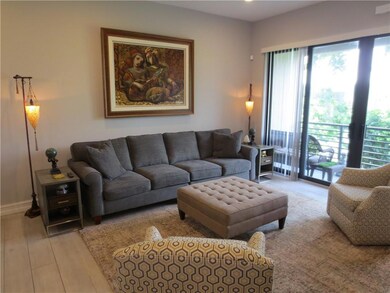 Living Room with Sliders to Balcony