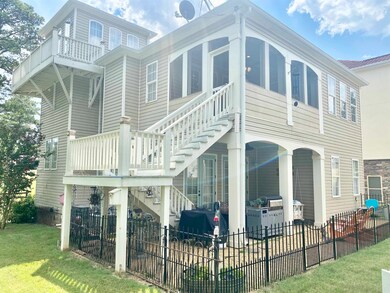 Beautiful screened in porch plus a lower level cov