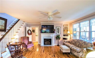 Gorgeous Cypress wood flooring in living room and 