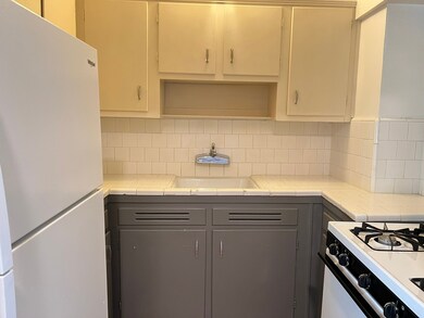 Kitchen has a gas range/oven. Comes with a refrige