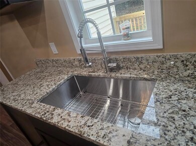 Interior details with a sink and light stone count