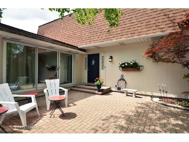Family Room sliding doors open to the courtyard.
