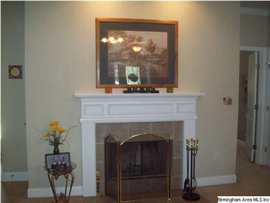 Cozy wood burning fireplace.