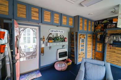 Rec room featuring heating unit