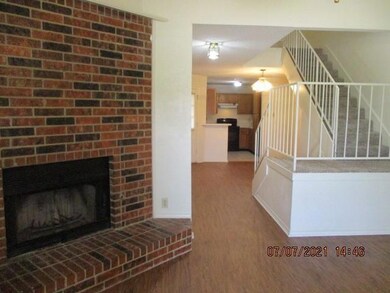 Open sightlines to the kitchen and dining area fro