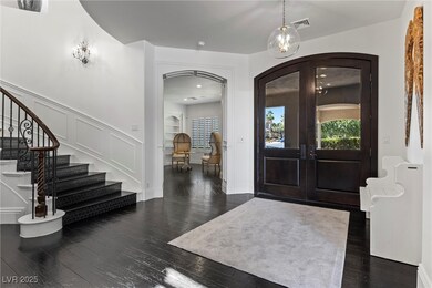 Foyer featuring arched walkways, visible vents, st