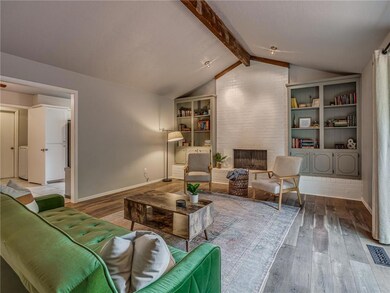 Living with Vaulted & Beamed Ceiling, Laminate Flo
