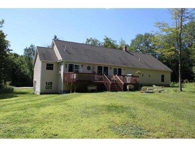 Exterior Back. large deck with hot...