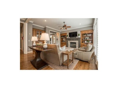 Kitchen opens to large hearthroom. Kitchen and hea