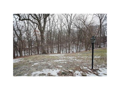 View. 1.82 acres with yard and woods.