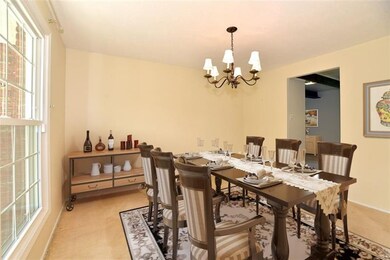 Dining Room has been virtually staged to show room