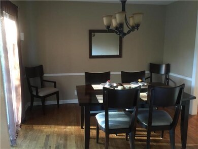 Ample space in dining room for family dinners or t