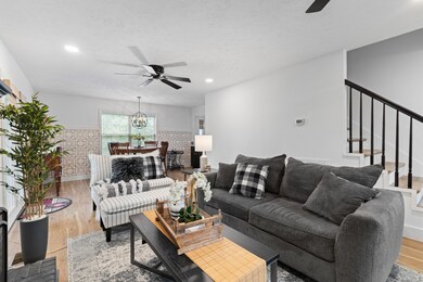 This stylish living room is incredibly spacious—perfect for any occasion, whether it’s game day, a holiday, or just a relaxed Saturday. There’s plenty of room for everyone!