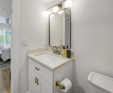 Ensuite bathroom with ensuite bathroom, vanity, to