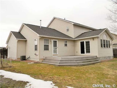 Exterior Back. The yard is fully fenced and offers a raised bed garden, mature trees and lots of space for play & or entertaining! Low traffic cul de sac setting.