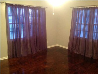 Beautiful dark-stained hardwood floors.