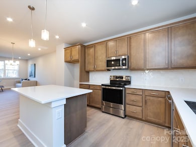 Quartz Countertops Across Kitchen and Island