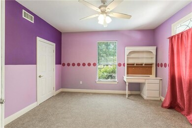 Cute first-floor bedroom has french door entrance,