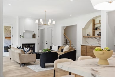 Kitchen opens to living space