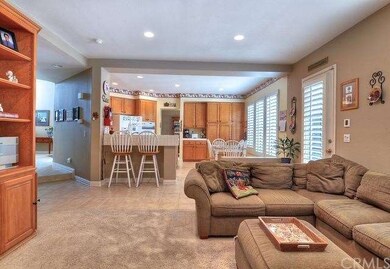 Kitchen flows into family room for easy entertaini