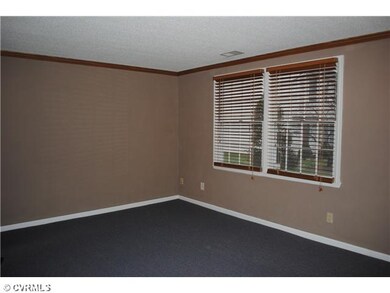 Living Room - Commercial grade carpet, fresh paint