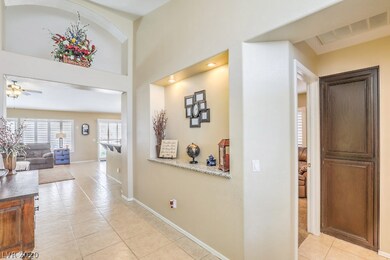 Entry into house showing hall cabinets & lighted s