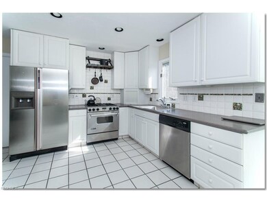 Eat-in Kitchen with Beautiful White Cabinets, Unde