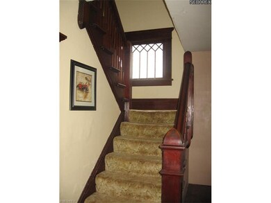Beautiful windows and stained woodwork.