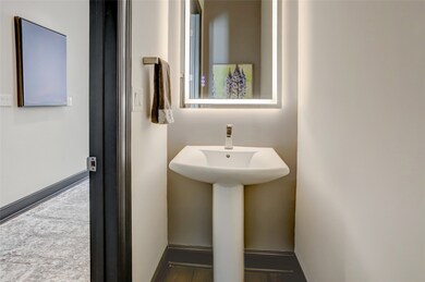 The half bath is conveniently located off the foye