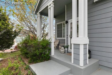Property entrance with covered porch