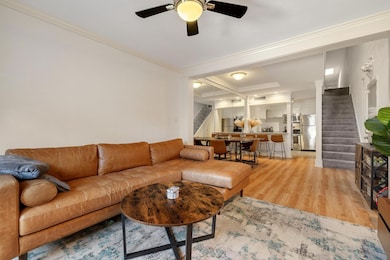 Living room featuring ornamental molding, ceiling 