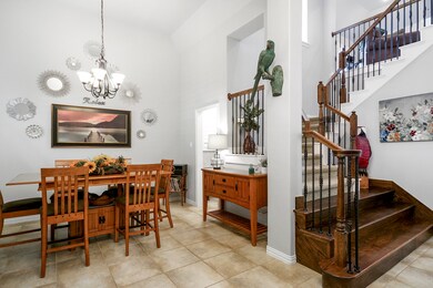 Formal Dining room can fit a large table and extra furniture. Beautiful chandler, front yard views, 2 entry ways! Easy access to the kitchen. Same tile flooring throughout!