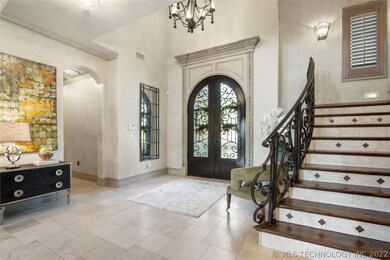 Exquisite double entry iron doors, hand forged by